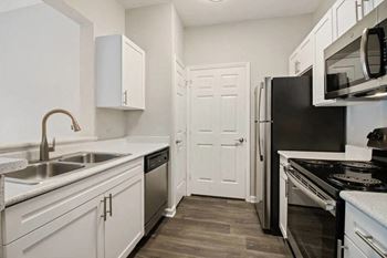 Kitchen with black appliances